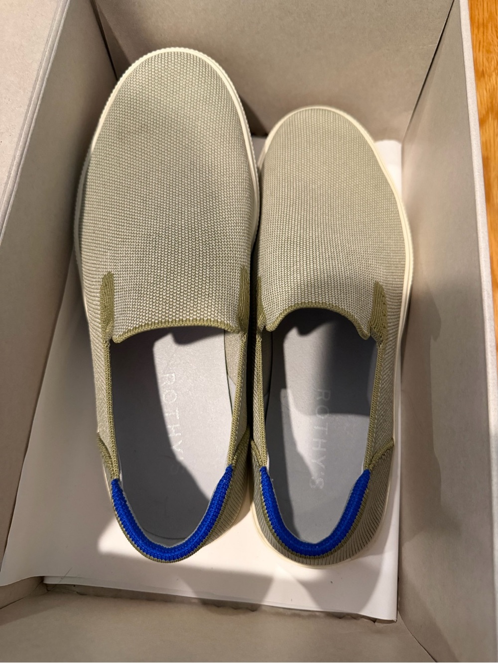 Rothy’s women’s 11.5 slip on sneakers in olive green